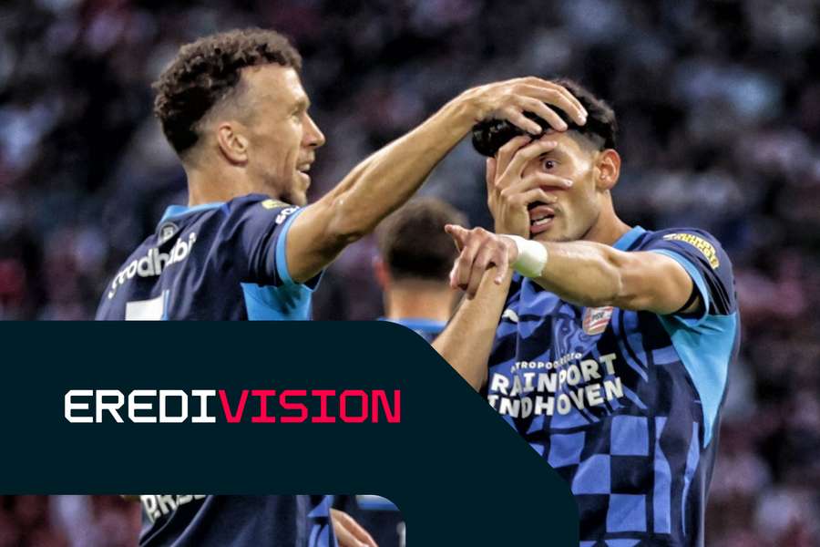 PSV's Ricardo Pepi (R) celebrates scoring against Ajax with Ivan Perisic