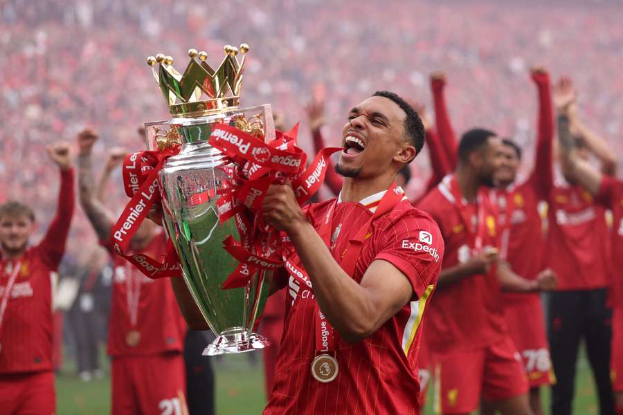 Trent Alexander-Arnold celebrates after Liverpool won the Premier League