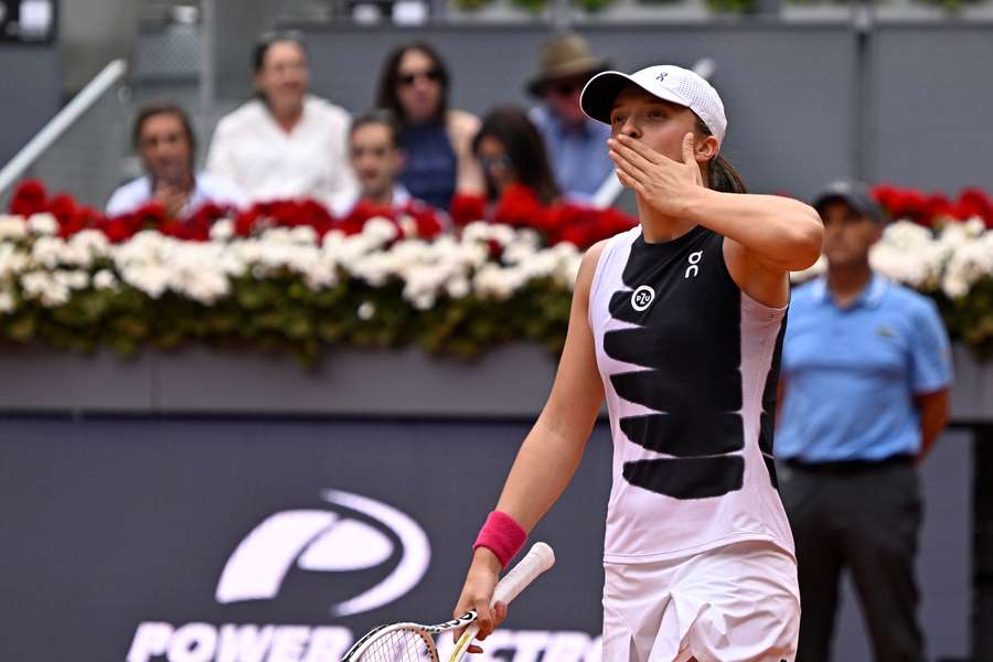 Swiatek celebrates after winning in Madrid