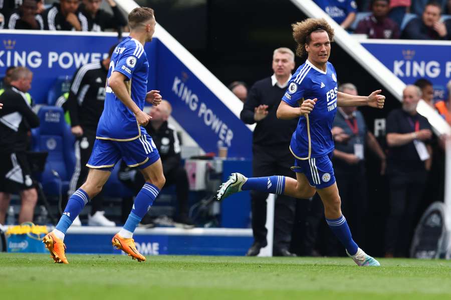 Leicester City's Belgian defender Wout Faes (R) celebrates after scoring his team second goal