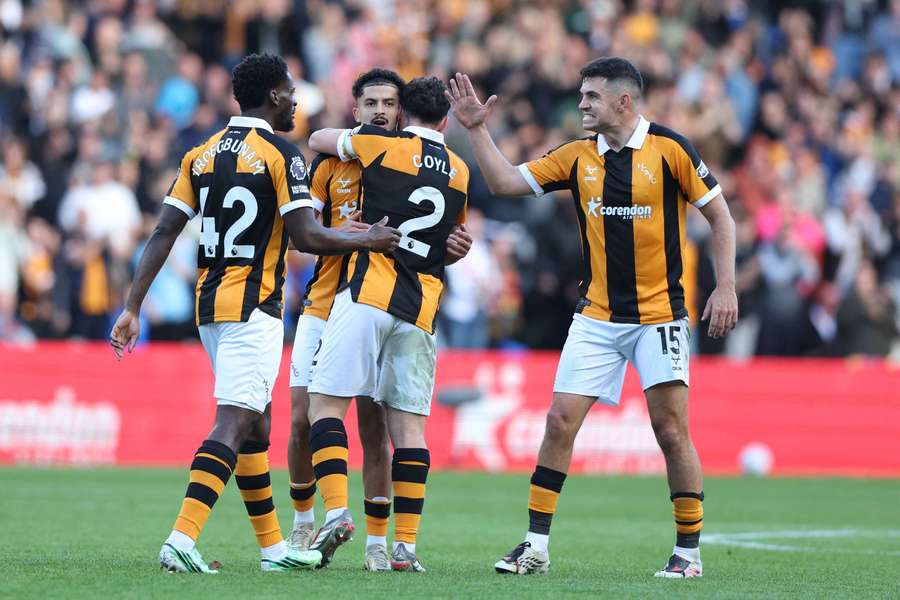 Mohamed Belloumi celebrates scoring Hull City's second goal with Lewie Coyle