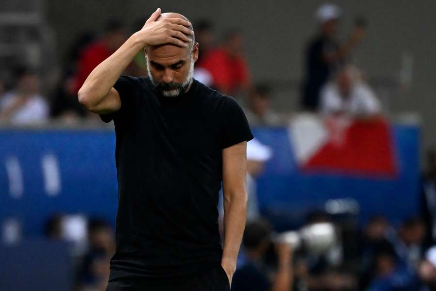 Manchester City's Spanish manager Pep Guardiola reacts during the 2023 Super Cup