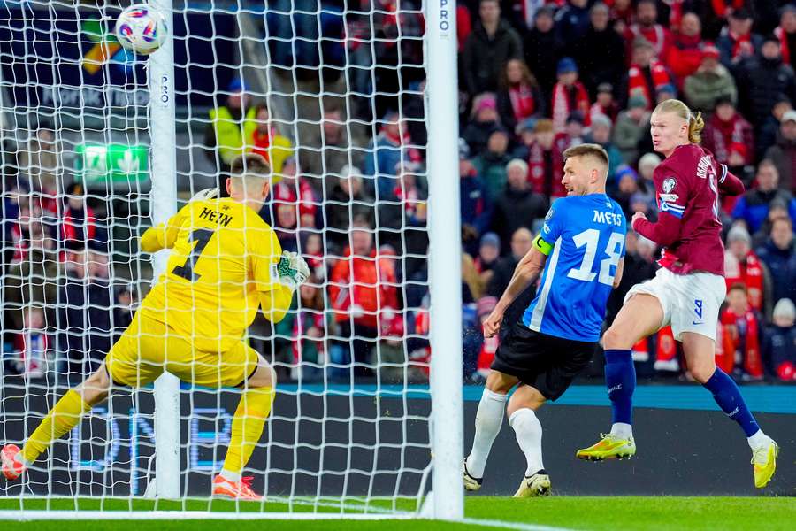 Erling Haaland heads in Norway's fourth goal of the night