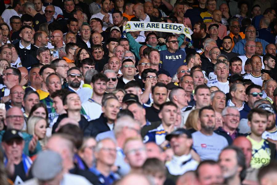 Leeds fans cheer on their team ahead of kick-off in the English Premier League football match between Leeds United and Tottenham Hotspur at Elland Road