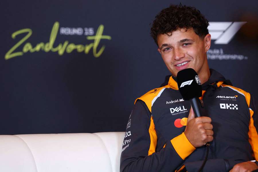 Lando Norris speaks during a press conference