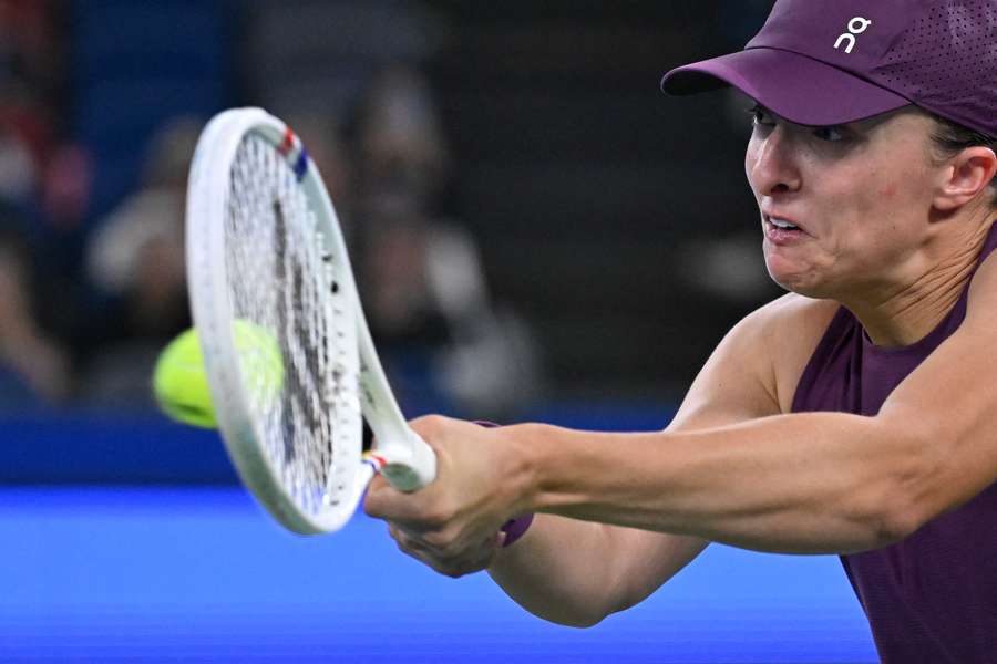 Iga Swiatek, da Polônia, comemora no quarto dia do Wuhan Open Iga Swiatek, da Polônia, comemora no quarto dia do Wuhan Open