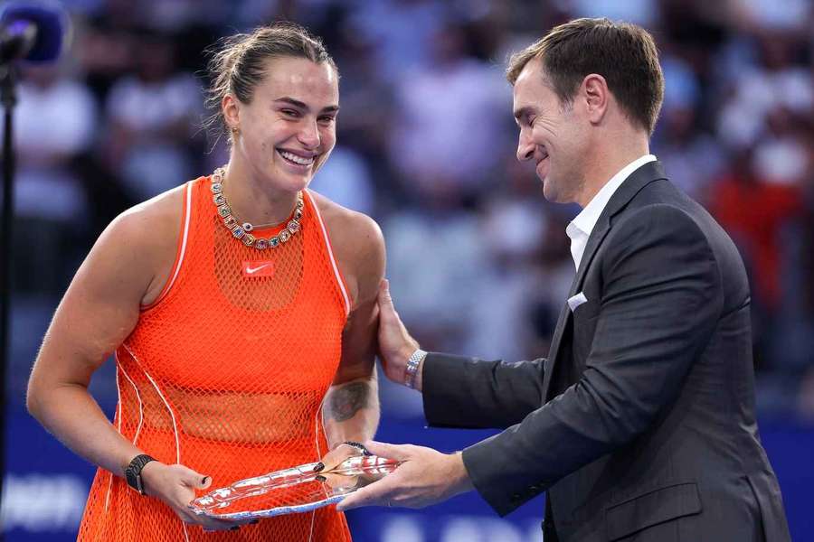 Aryna Sabalenka receives the runner-up trophy at the US Open Aryna Sabalenka receives the runner-up trophy at the US Open