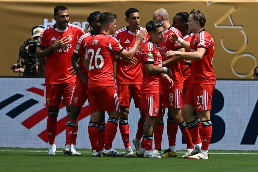 Benfica's players celebrate scoring the opening goal 