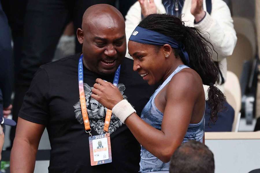 Coco Gauff and her dad Corey celebrate after winning the women's singles final