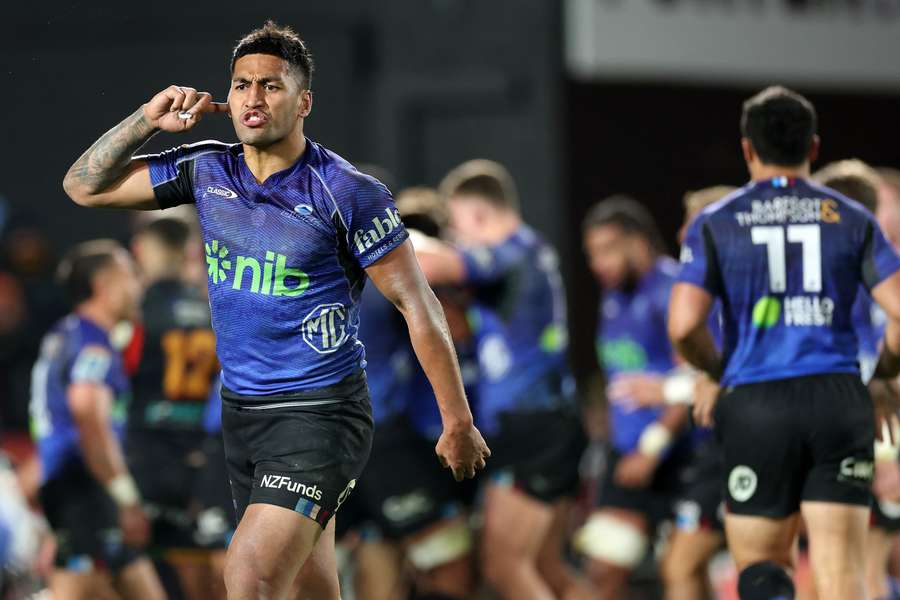 Rieko Ioane gestures to the crowd after the Blues' win