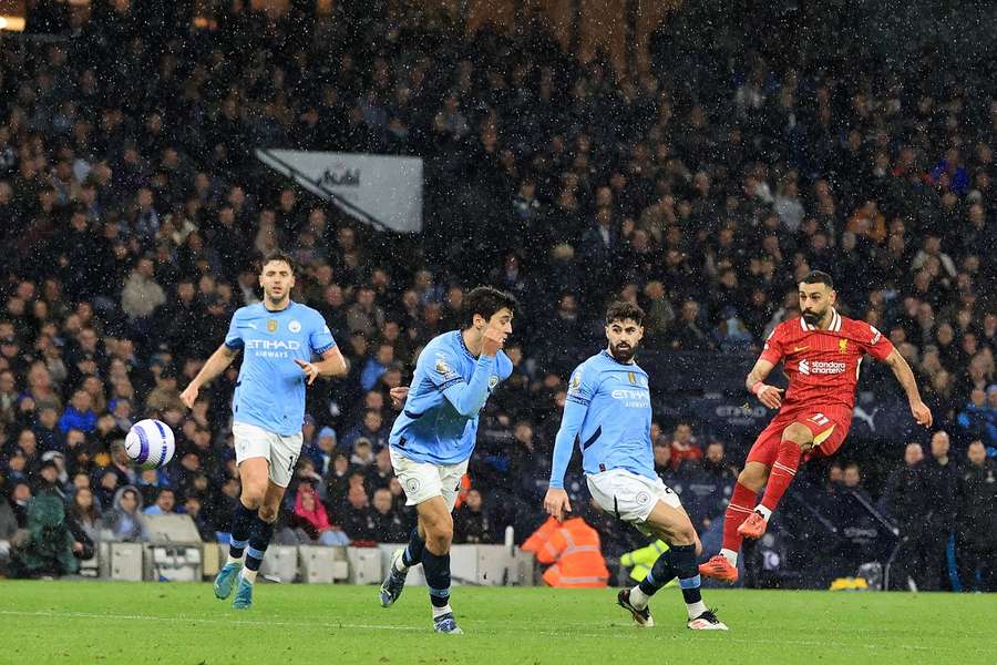 Manchester City versus Liverpool; Mohammed Salah shoots at goal Manchester City versus Liverpool; Mohammed Salah shoots at goal