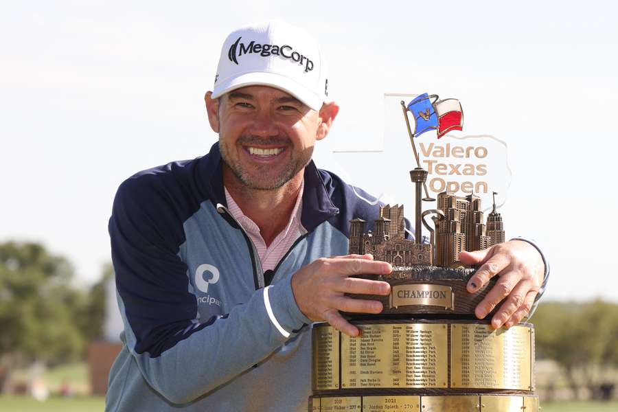 Brian Harman poses with the trophy after winning the Texas Open