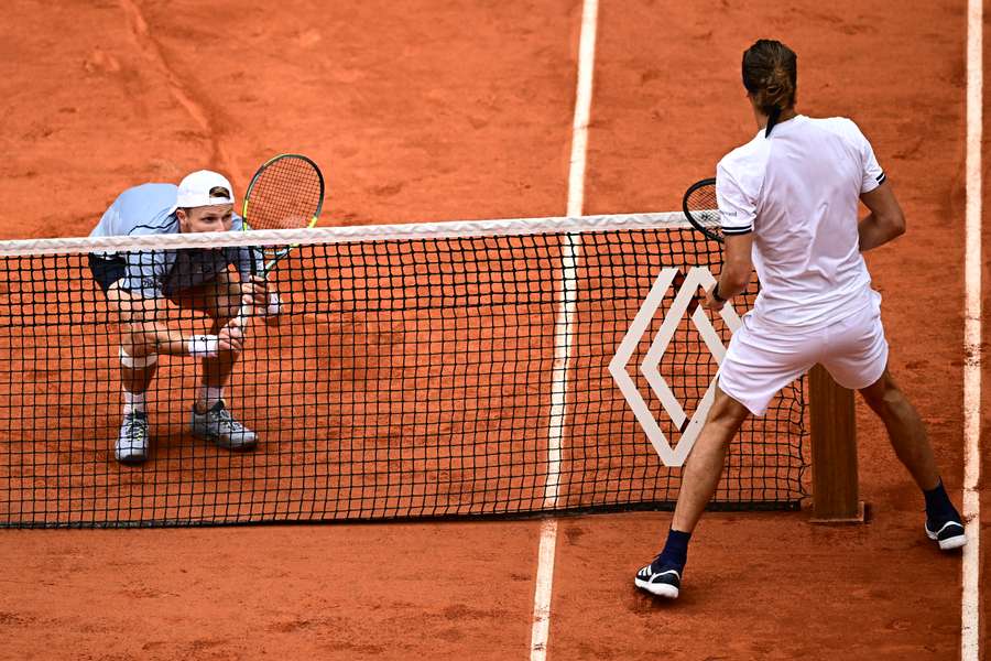 Jesper de Jong ducks to avoid a volley from Alexander Zverev Jesper de Jong ducks to avoid a volley from Alexander Zverev
