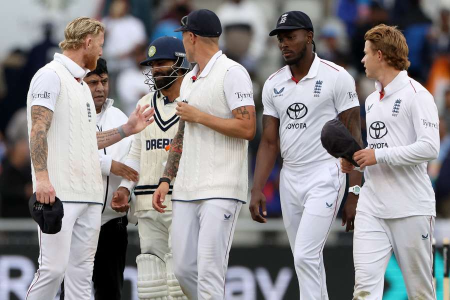 Ben Stokes and Ravindra Jadeja have a robust discussion during the final moments of the fourth Test in Manchester. 