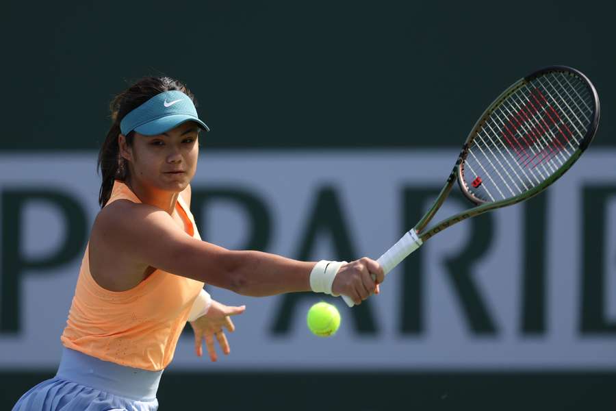 Emma Raducanu of Great Britain in action against Danka Kovinic of Montenegro