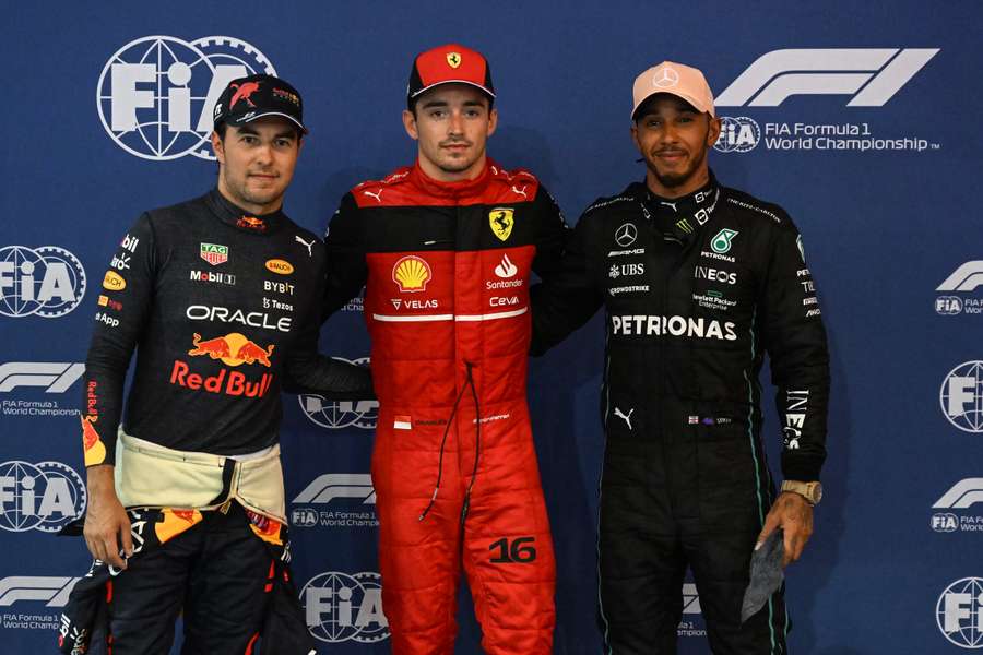 Red Bull Racing's Sergio Perez, Ferrari's Charles Leclerc and Mercedes' Lewis Hamilton pose for a photo after qualifying