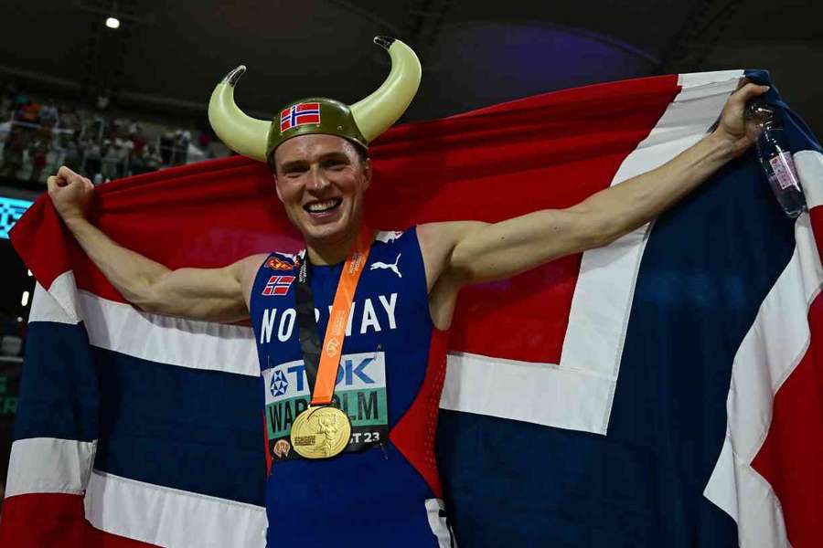 Karsten Warholm celebrates winning gold in the 400m hurdles