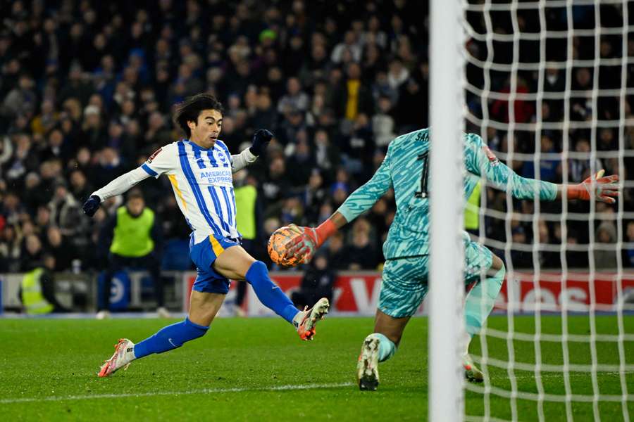 Kaoru Mitoma scores past former teammate Robert Sanchez