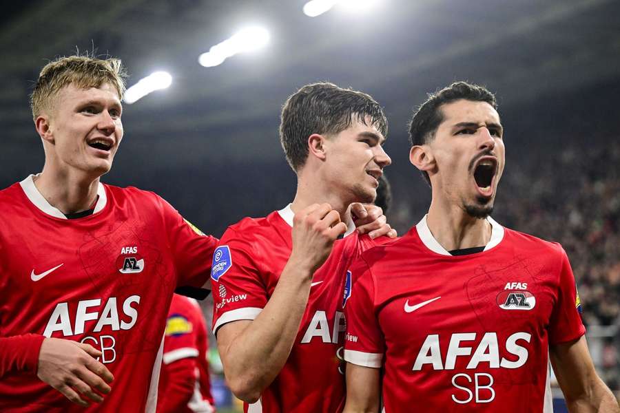 AZ's Isak Jensen (L), Wouter Goes, and Alexandre Penetra celebrate the 1-0 against Telstar AZ's Isak Jensen (L), Wouter Goes, and Alexandre Penetra celebrate the 1-0 against Telstar