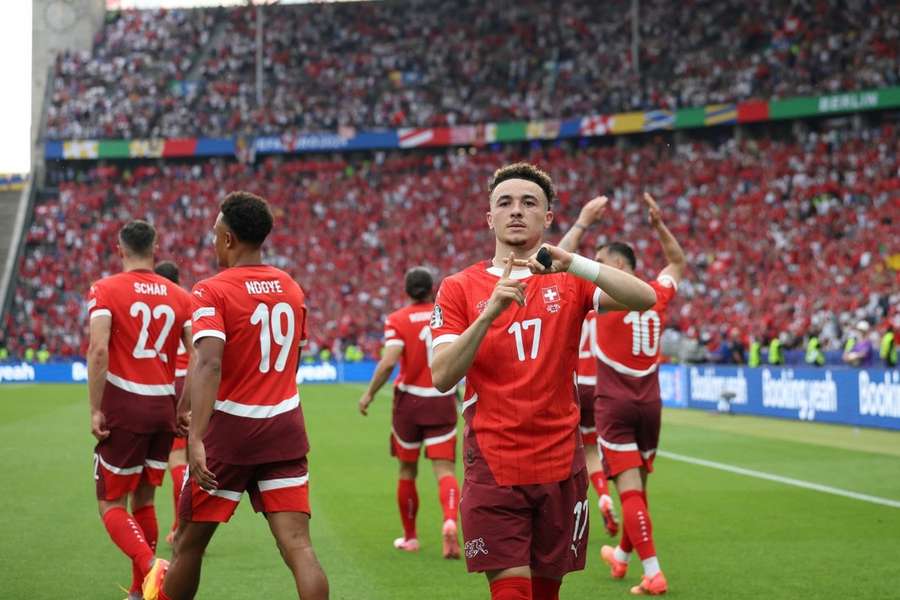 La Suisse célébrant sa victoire sur l'Italie.