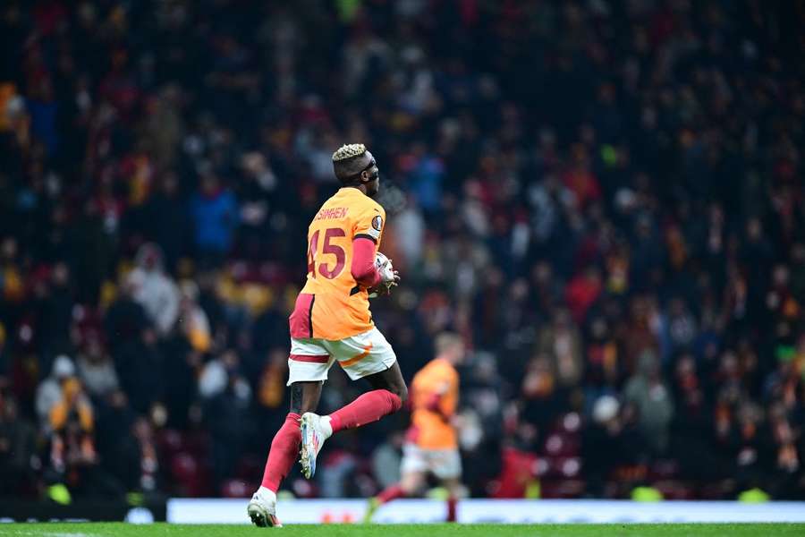 Osimhen runs back with the ball Osimhen runs back with the ball