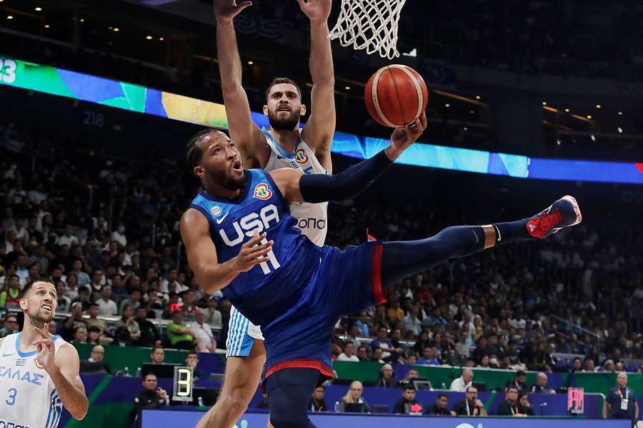 Jalen Brunson of the USA in action against Georgios Papagiannis of Greece