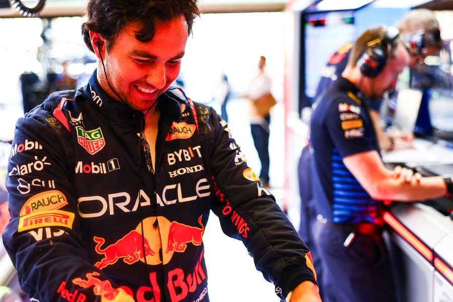 Sergio Perez of Mexico and Oracle Red Bull Racing prepares to drive in the garage prior to the F1 Grand Prix of Abu Dhabi