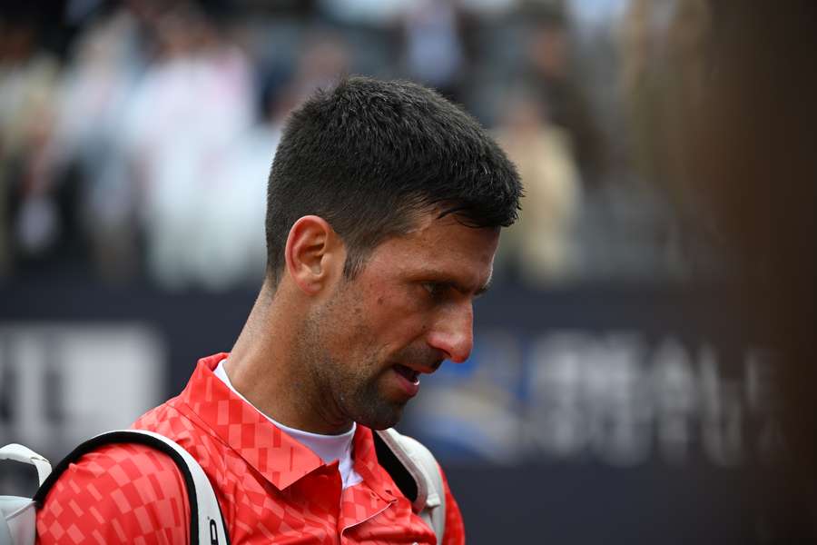 Djokovic leaves the court after his defeat
