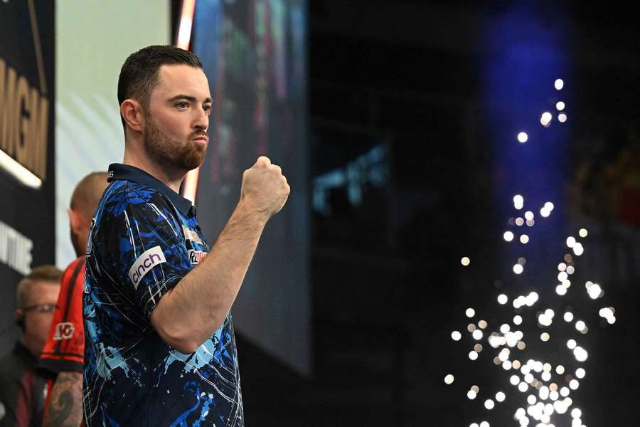 Humphries celebrates during his match with Van Gerwen