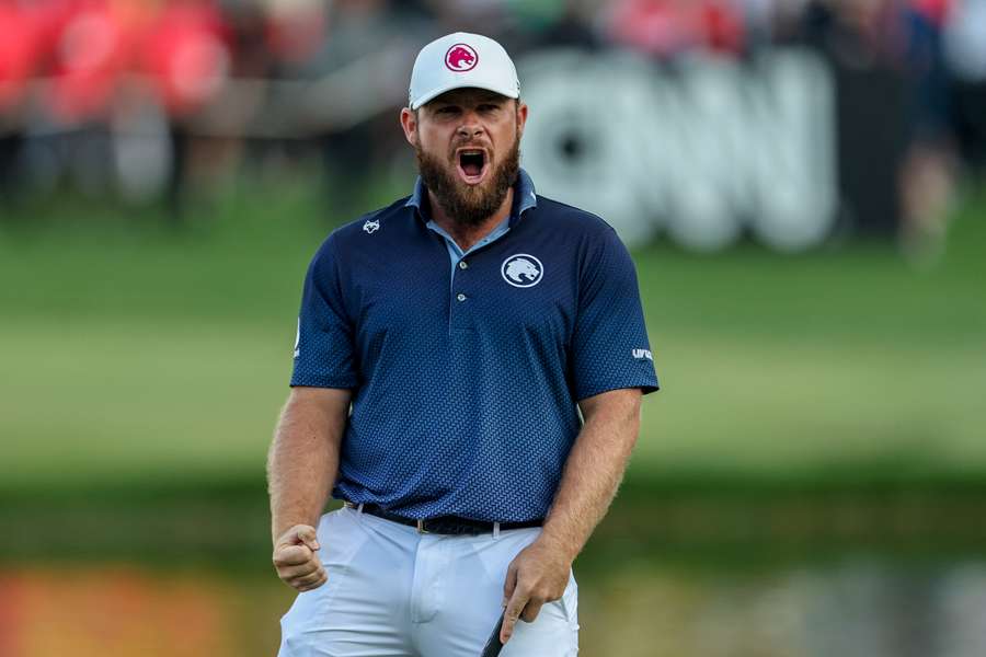 England's Tyrrell Hatton celebrates after winning the Dubai Desert Classic