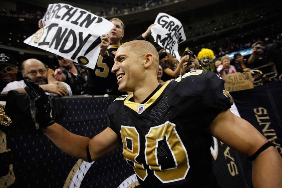Jimmy Graham celebrates with fans after beating the Carolina Panthers (2012)
