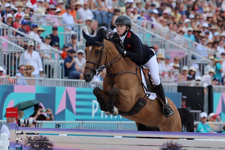 Harry Charles of Britain riding Romeo 88 in action