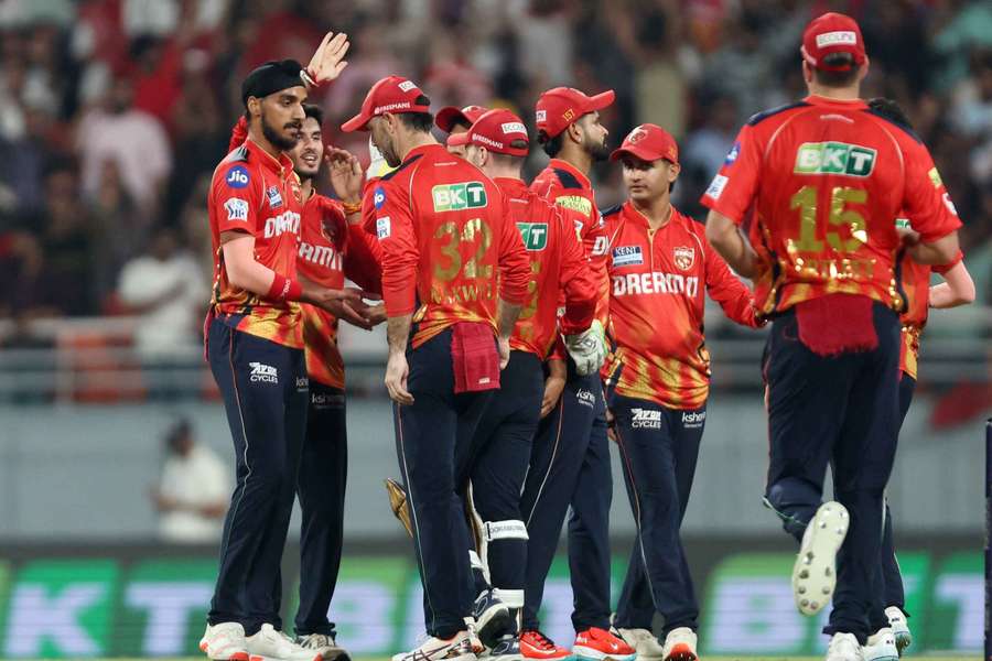 Punjab Kings players celebrate after winning the match