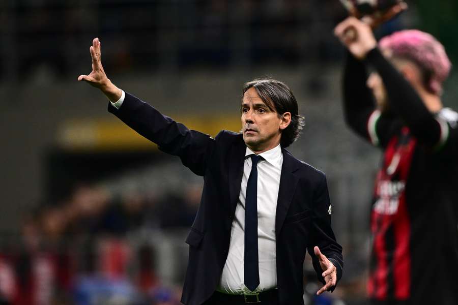 Inter Milan's Italian head coach Simone Inzaghi gives instructions during the UEFA Champions League semi-final first leg match against AC Milan