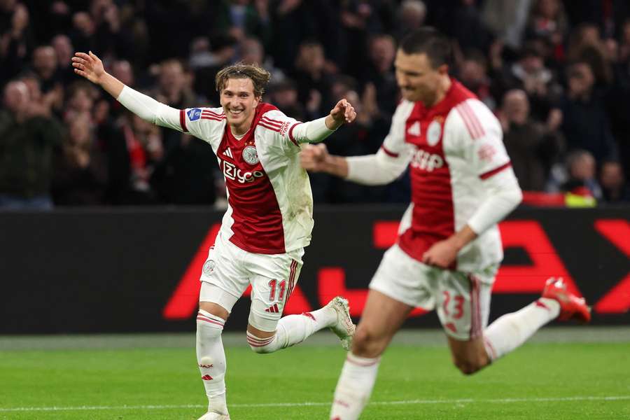 Ajax's Mika Godts (L) celebrates Steven Berghuis' 2-0 against Sparta Rotterdam