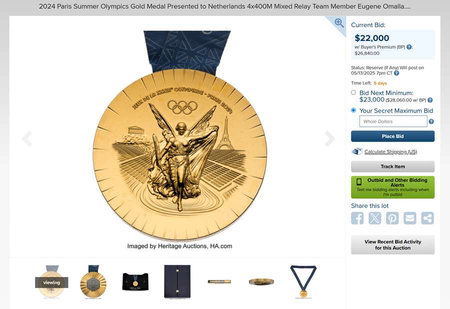 The Gold Medal Eugene Omalla is up for an online auction The Gold Medal Eugene Omalla is up for an online auction