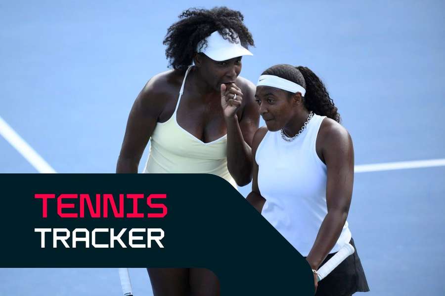 Venus Williams, left, talks with Hailey Baptiste during their doubles match against Eugenie Bouchard and Clervie Ngounoue in Washington