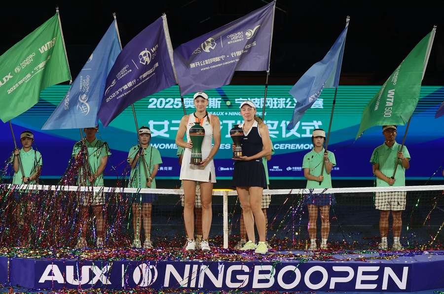 Rybakina and Alexandrova pose with their trophies Rybakina and Alexandrova pose with their trophies