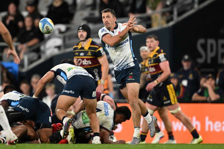 Jake Gordon passes the ball in a recent Super Rugby game.