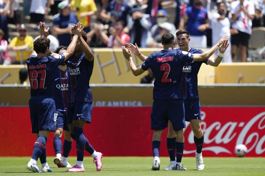 PSG celebrate against Atletico Madrid