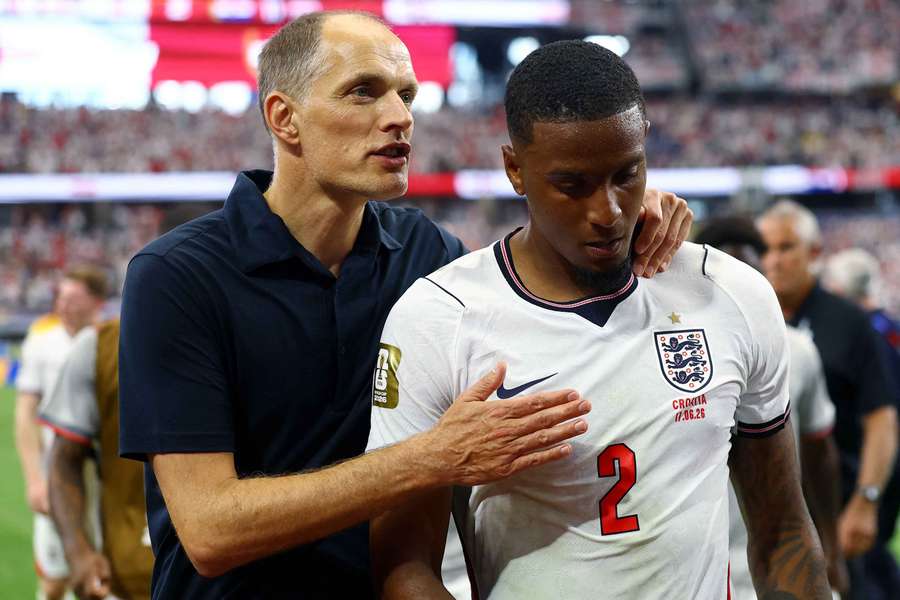 England manager Thomas Tuchel and Ezri Konsa celebrate after the match England manager Thomas Tuchel and Ezri Konsa celebrate after the match