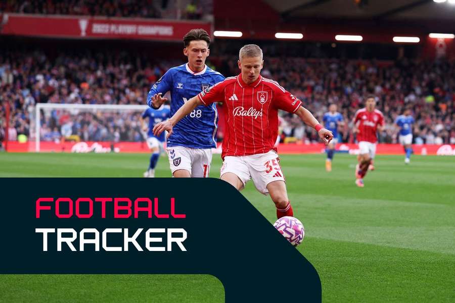 Oleksandr Zinchenko of Nottingham Forest is challenged by Chris Rigg 