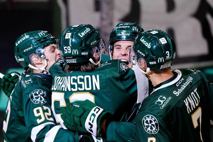 Farjestad players celebrate taking a 2-0 lead