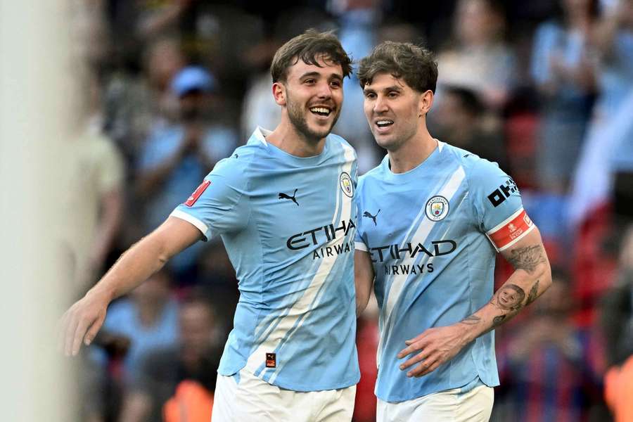 John Stones (right) will leave Manchester City at the end of the season