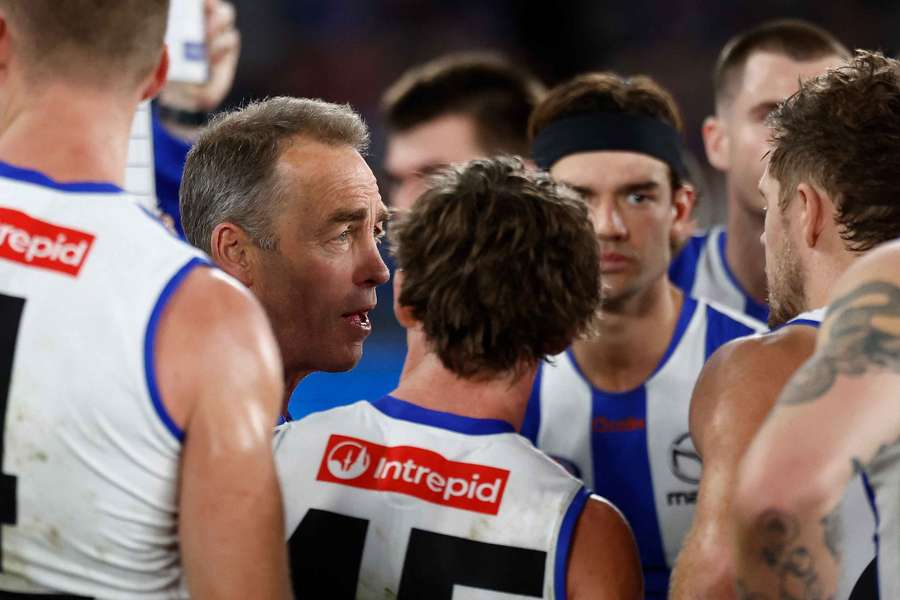 Alastair Clarkson speaking to his players during a quarter-time break. Alastair Clarkson speaking to his players during a quarter-time break.