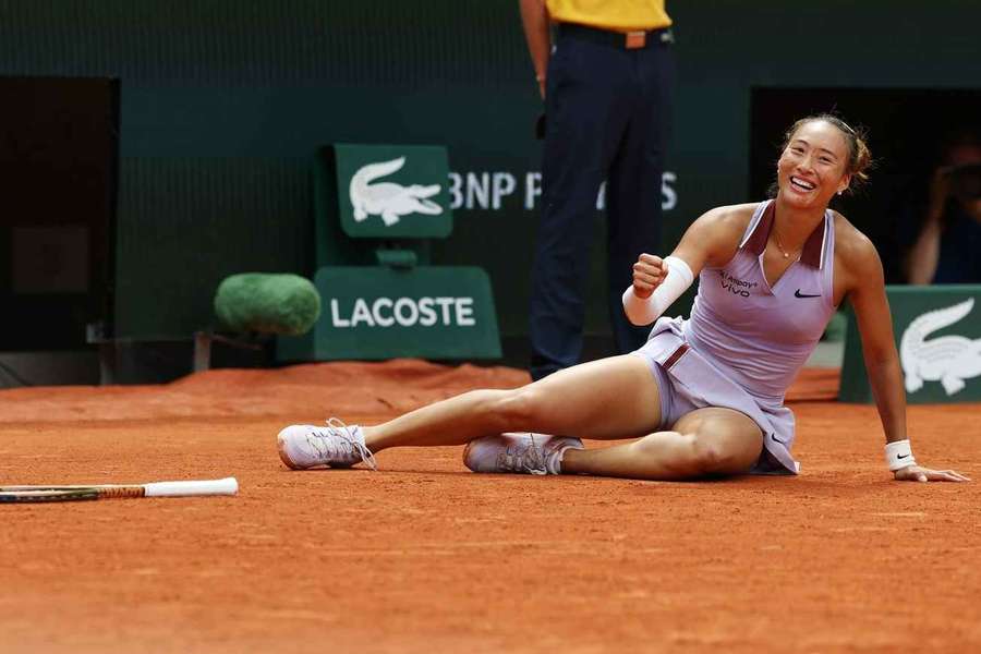 Zheng celebrates her win