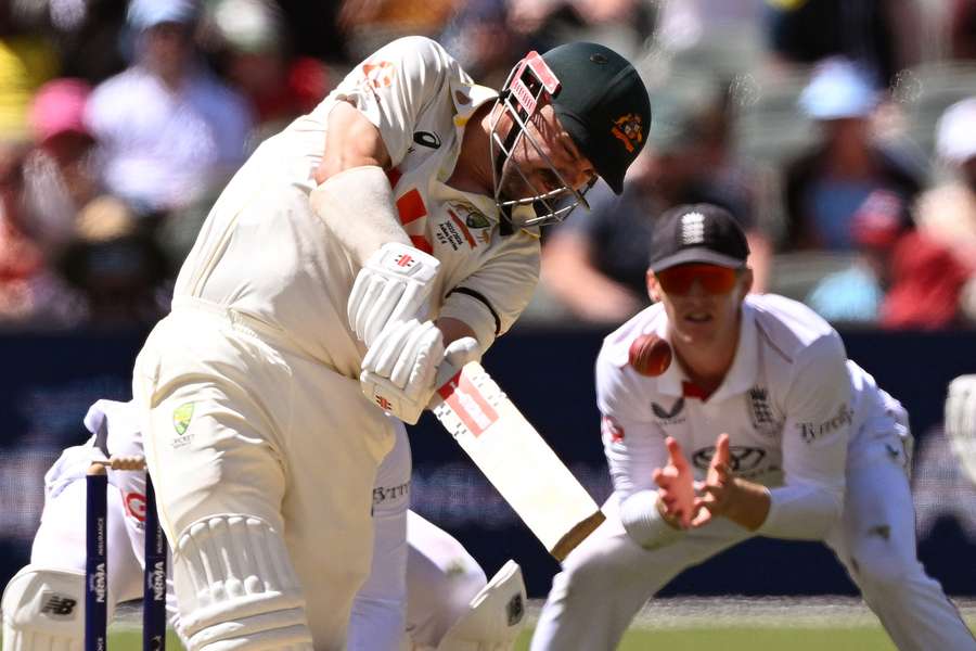 Australia's Travis Head (L) hits a six on the third day of the third Ashes Test
