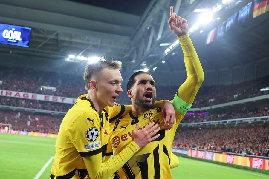 Beier and Emre Can celebrate