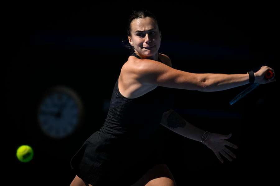 Aryna Sabalenka hits a return to Madison Keys