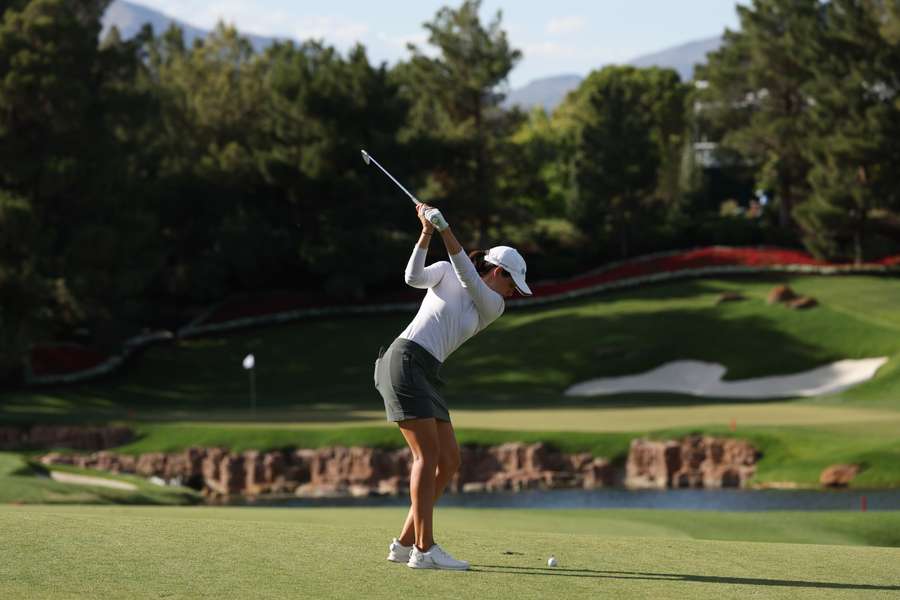 Albane Valenzuela of Switzerland hits from the ninth fairway on day two